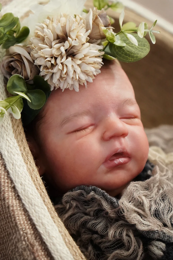 Noa lifelike vinyl reborn baby doll facial view