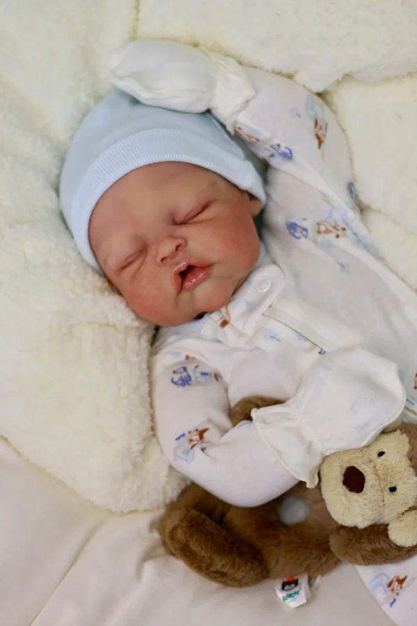 Scout reborn baby doll soft silicone head and limbs